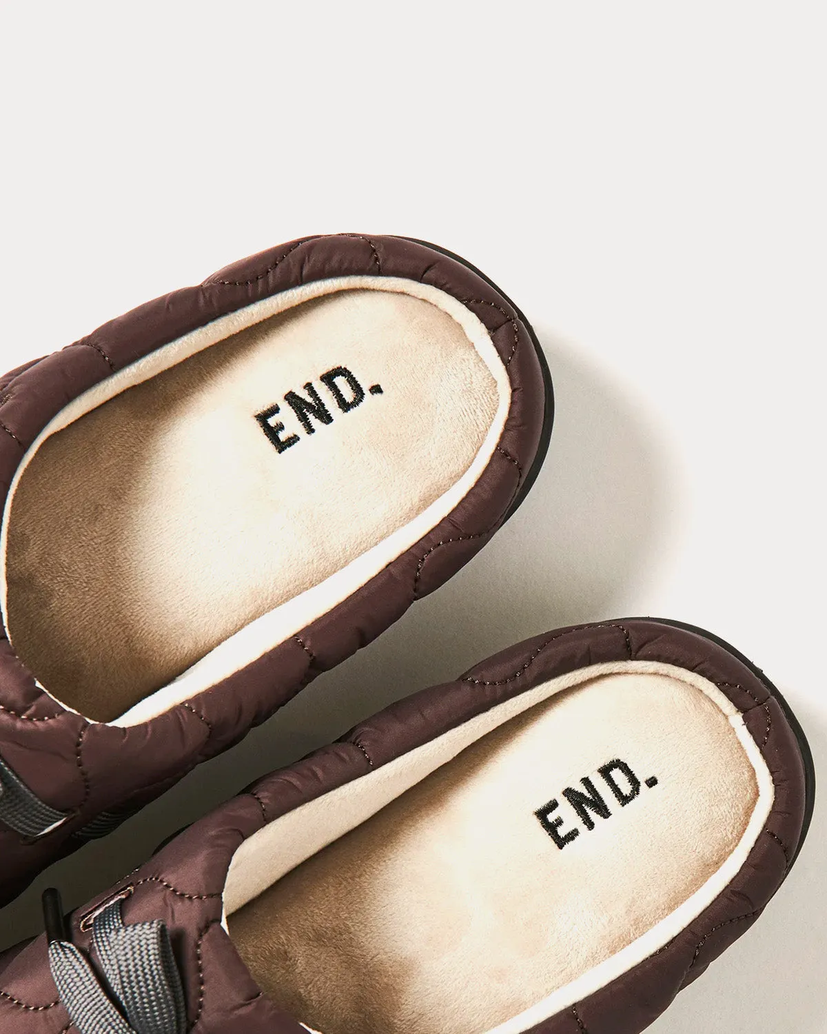x END Surplus Quilting Brown Slip Ons